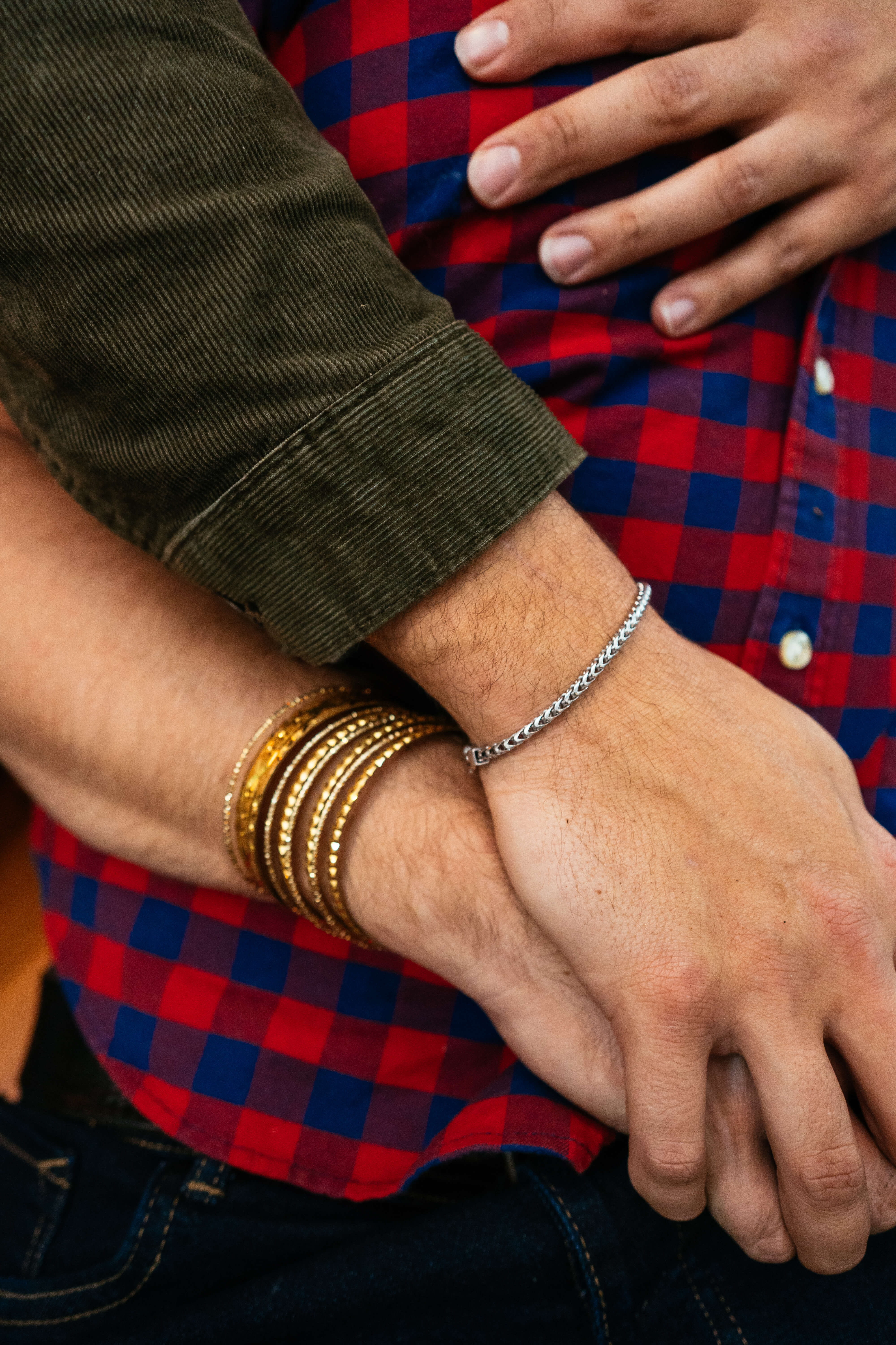 Two hands embracing